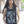 PUCK HCKY 'Shoot Pucks Not People - Or Death' sleeveless basketball jersey in black, grey, and white front view ono model