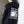 PUCK HCKY 'Shoot Pucks Not People - Television' full zip hockey hoodie in black back view on model