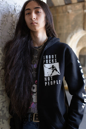 PUCK HCKY 'Shoot Pucks Not People - Television' full zip hockey hoodie in black front view on model
