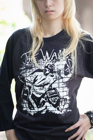 PUCK HCKY 'The Wall' raglan in graphite heather with black sleeves on model