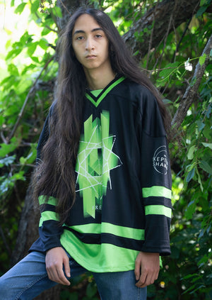 TOTEM 'Freya' hockey jersey in black and neon green front view on model