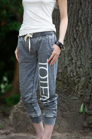 TOTEM 'Logo' women's cropped ankle fit joggers in dark grey on model close up