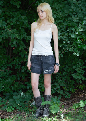 TOTEM 'Logo' women's fleece shorts in black camo on model