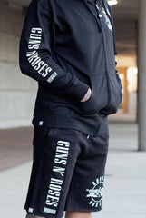 GUNS N' ROSES 'WORLDWIDE' fleece hockey shorts in black front view on model