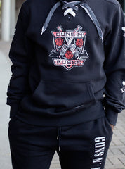 GUNS N' ROSES 'THE KINGS' laced pullover hockey hoodie in black with laces in grey and white front view on model