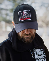 ROB ZOMBIE 'THUNDER FISTS 65' stretch fit hockey cap in in black with charcoal brim front view on model