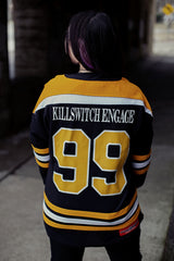 KILLSWITCH ENGAGE 'SAVE ME' hockey jersey in black, gold, and white back view on model