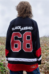 BLACK SABBATH ‘IRON MAN’ deluxe hockey jersey in black, white, and red back view on model