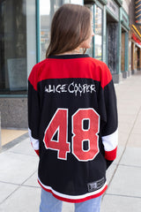 ALICE COOPER ‘THE SPIDERS’ hockey jersey in black, red, and white back view on model