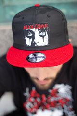 ALICE COOPER 'THE SPIDERS' snapback hockey cap in black camo with red brim front view on model