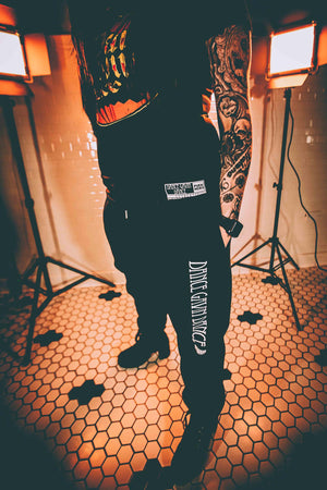 DANCE GAVIN DANCE 'MIDNIGHT CRUSADE' hockey jogging pants in black on model