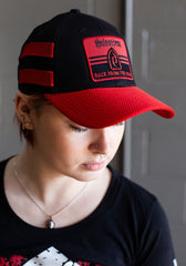 HALESTORM 'BACK FROM THE DEAD' stretch fit hockey cap in black with red brim and stripes on model