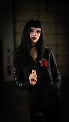 HEARTSICK ‘THE SNAKE AND THE ROSE’  women's full zip hockey hoodie in acid black front view on model