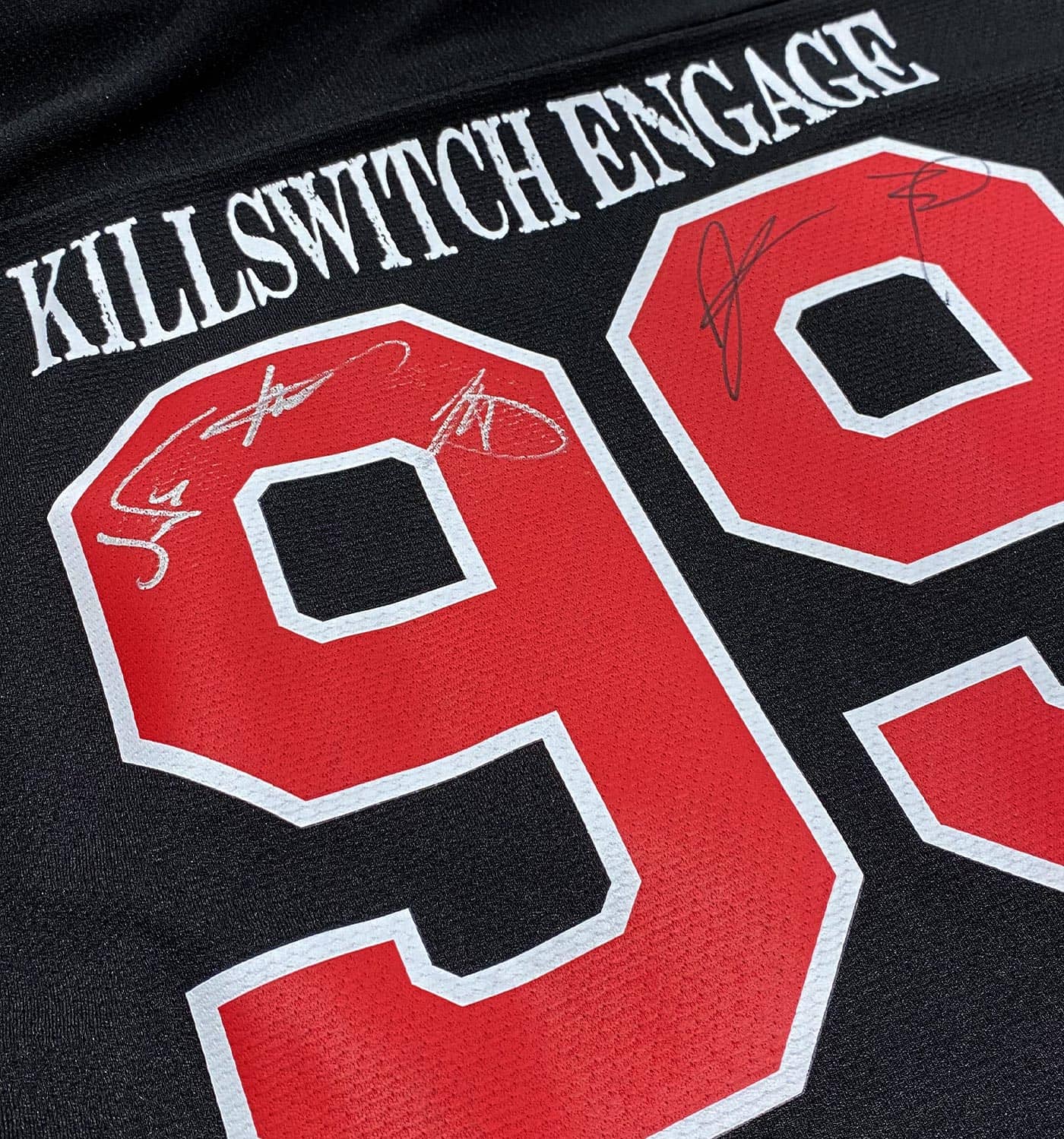 KILLSWITCH ENGAGE 'SKATE BY DESIGN' limited edition autographed hockey jersey in black and red back view