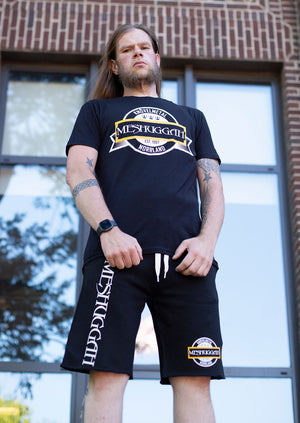 Meshuggah 'Knovelmetal' fleece hockey shorts in black on model
