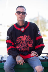 MOTÖRHEAD 'EAGLE' HOCKEY hockey jersey in black and red front view on model