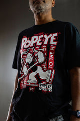 POPEYE 'STRONG TO THE FINISH' short sleeve hockey t-shirt in black front view on model