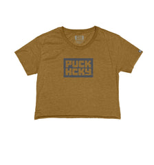 PUCK HCKY 'BOX' women's hockey crop top in gold front view