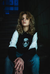 PUCK HCKY 'CORPSE PAINT' pullover hockey hoodie in black and white front view on model