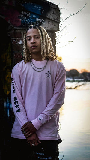 PUCK HCKY 'EQUIPMENT HAZMAT' long sleeve hockey t-shirt in pink front view on model