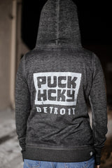 PUCK HCKY ‘DETROIT’ women's full zip hockey hoodie in acid black back view on model