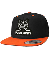 PUCK HCKY 'SKATE MARKS' flat bill snapback hockey cap in black with orange brim