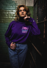 PUCK HCKY 'VAPORWAVE' long sleeve hockey t-shirt in purple front view on model