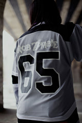 ROB ZOMBIE 'SKATERBEAST' deluxe hockey jersey in grey, black, and white back view on model