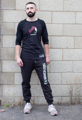 SHINEDOWN ‘ADRENALINE’ hockey jogging pants in black front view on model