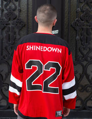 SHINEDOWN ‘PLANET ZERO’ deluxe hockey jersey in red, black, and white back view on model