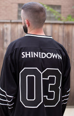 SHINEDOWN ‘WHISPER’ hockey jersey in black and white back view on model
