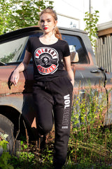 VOLBEAT ‘7 SHOTS’ hockey jogging pants in black front view on female model