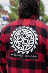WHITECHAPEL 'MARK OF THE SKATE BLADE' hockey flannel in red plaid back view on model